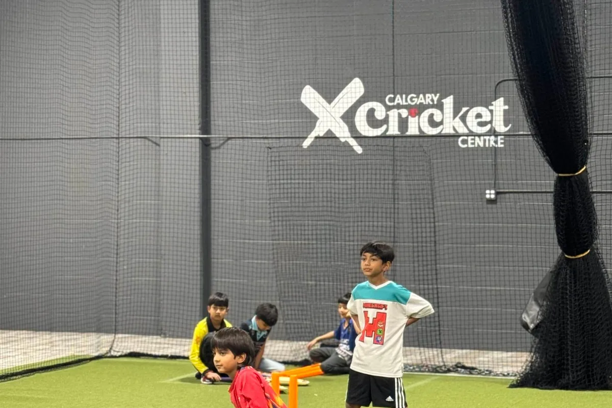 Kids training inside the Calgary Cricket Centre hall